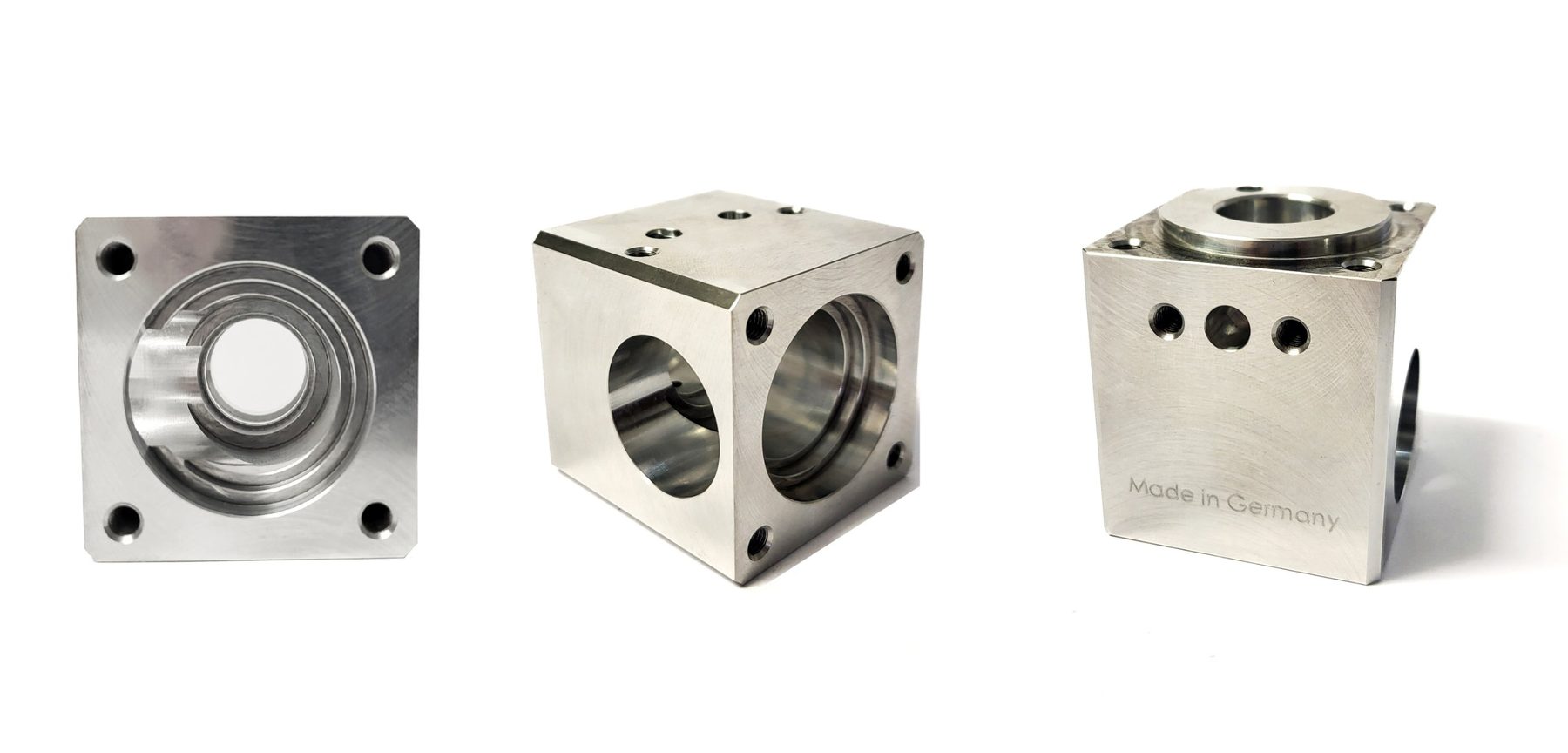 CNC-Lohnfertigung: drei 5-Achs-gefräste Gehäuseteile aus Aluminium